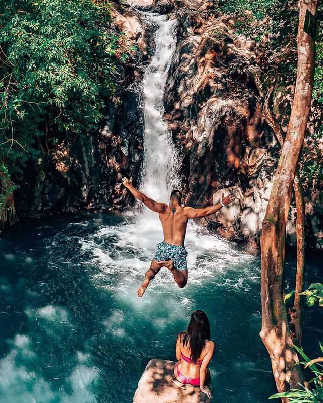 Jump and slide at Aling-Aling Waterfall