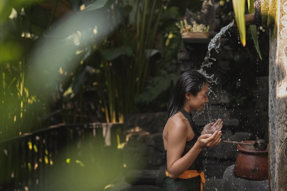 Sunrise yoga above the jungle at Cicada Resort Bali Ubud